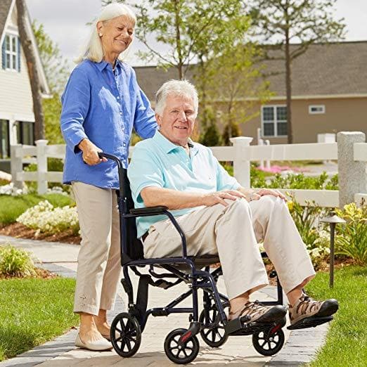 Carex Lightweight Transport Foldable Wheelchair with Footrests - primehubstore.shop Transport Chairs